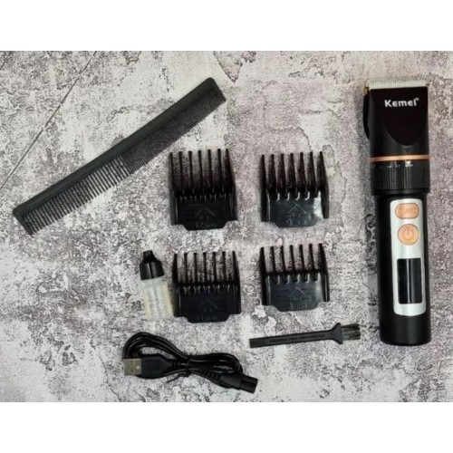 Машинка для стрижки Kemei LFJ-KM-5073 3 насадки Чорний (2390000002) Машинка для стрижки Kemei LFJ-KM-5073 3 насадки Чорний (2390000002)