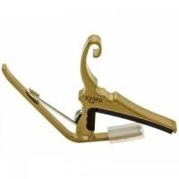 Каподастр Kyser KG6GA Quick-Change Acoustic Guitar Capo Gold Каподастр Kyser KG6GA Quick-Change Acoustic Guitar Capo Gold