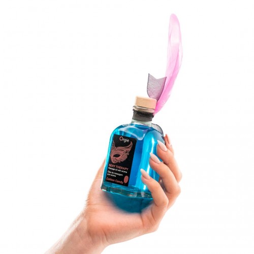 Набір для масажу Orgie – Sexy Therapy Cotton Candy (100 мл), їстівна розігрівальна олія + пір’їнка Набір для масажу Orgie – Sexy Therapy Cotton Candy (100 мл), їстівна розігрівальна олія + пір’їнка